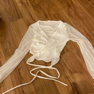 White wraparound long mesh sleeve going out top